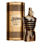 Jean Paul Gaultier Le Male Elixir perfume bottle next to its signature gold cylindrical packaging canister, set against a plain white background.